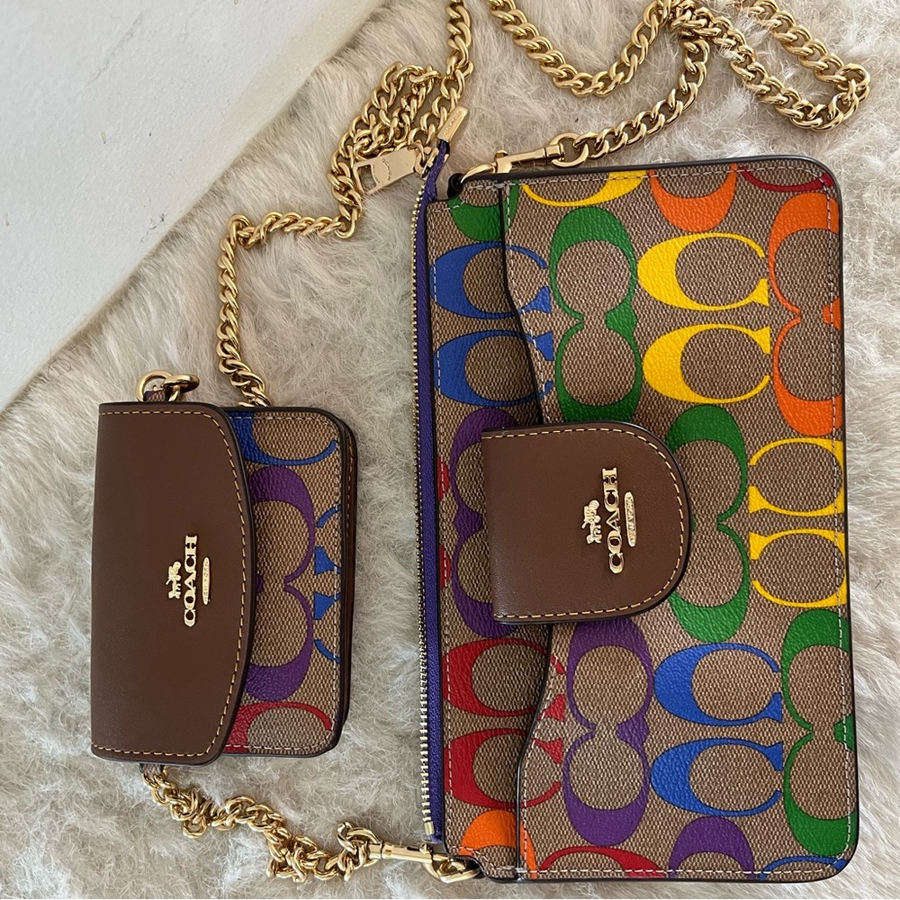 Rainbow signature COACH crossbody with gold chain link strap. Carried once!